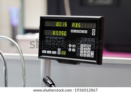2 axis digital readout console for lathe machine. Selective focus. Royalty-Free Stock Photo #1936012867