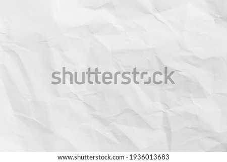 Recycled crumpled white paper texture or paper background for design with copy space for text or image Royalty-Free Stock Photo #1936013683