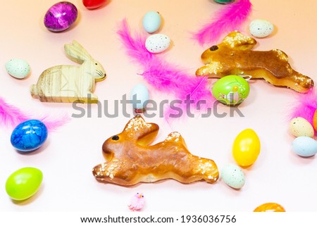 Easter eggs, Easter bunny, chicks on a pastel background