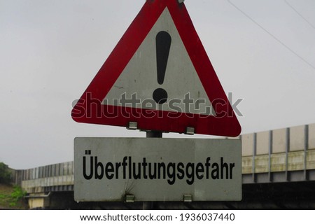 a warning sign for flooding or the danger of flooding