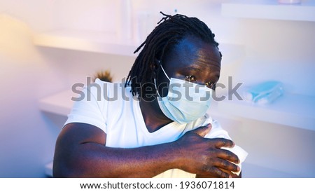 Portrait of african american black man getting vaccine against coronavirus. High quality photo