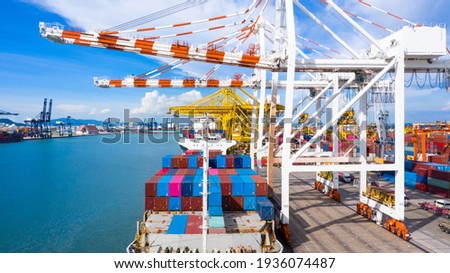 Aerial view container ship, import export commerce global business trade logistic and transportation of International by container ship boat, Cargo freight shipping maritime sea port terminal. Royalty-Free Stock Photo #1936074487