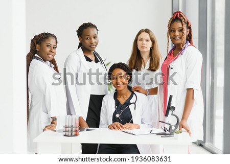 group of young african medical workers on white background