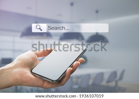 Mobile search data information concept with modern cell phone in hand and digital search page screen