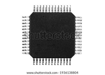 Macro shot microchip isolated on white background. Computer hardware technology. Integrated communication processor isolated over white. Information engineering. Semiconductor. PCB. Closeup Royalty-Free Stock Photo #1936138804