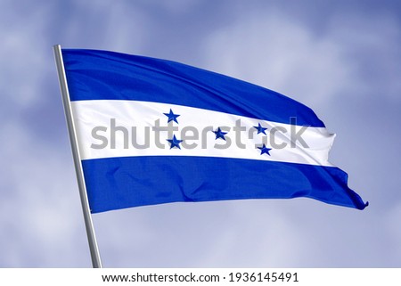 Honduras flag isolated on sky background. close up waving flag of Honduras. flag symbols of Honduras.