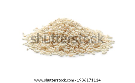 Pile of sesame seeds on white background Royalty-Free Stock Photo #1936171114