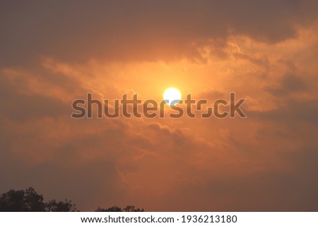 Sun with scenic sunbeam as background
