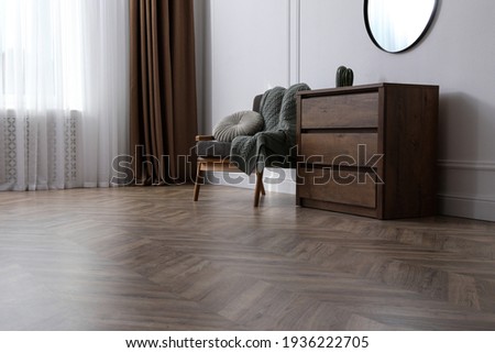 Modern living room with parquet flooring and stylish furniture Royalty-Free Stock Photo #1936222705
