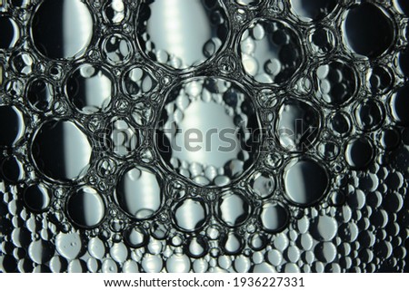 oil bubbles in the water macro photographic background