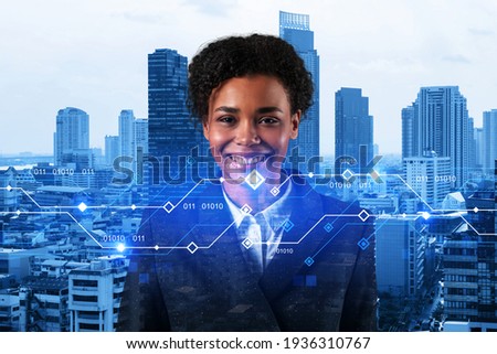 Successful smiling attractive black businesswoman pondering on technology at business process to achieve tremendous growth for client. Tech hologram icons over Bangkok background