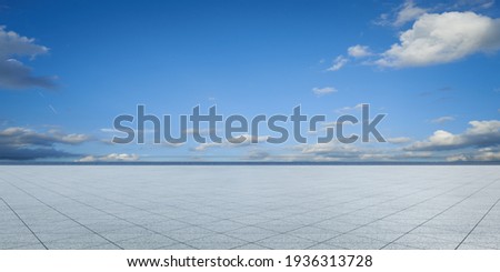 Empty triangle shape stone tiles floor with sky . Royalty-Free Stock Photo #1936313728