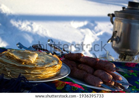 Festive table with pancakes on Shrove Tuesday