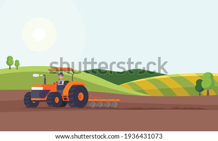 Tractor plowing a field for planting crops. Agriculture Royalty-Free Stock Photo #1936431073