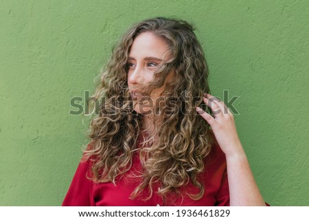 portrait of cute curly blonde hair girl
