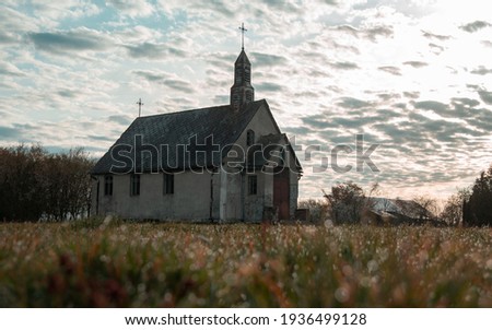 Old abandoned church in countryside in the morning Royalty-Free Stock Photo #1936499128