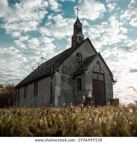 Old abandoned church in countryside in the morning Royalty-Free Stock Photo #1936499158