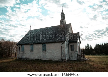 Old abandoned church in countryside in the morning Royalty-Free Stock Photo #1936499164