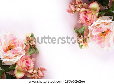 A bouquet of light peonies on a white background. A delicate festive floral arrangement. Background for greeting cards, greetings, invitations.