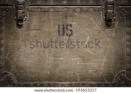 Green grunge military chest background with rivets