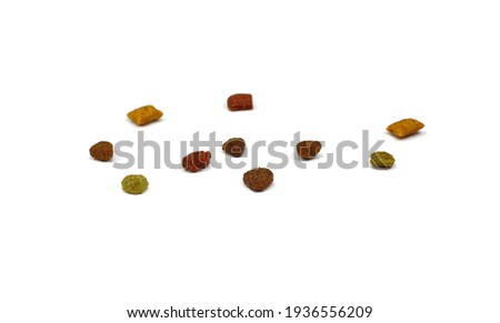 Dry cat food isolated on white background, top view