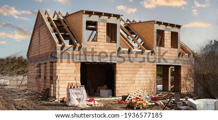 Building Site With House Under Construction - high resolution photo.