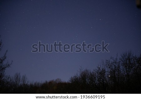 planets Jupiter and Saturn with its satellites on summer night sky of 2020 shining trough millions of stars 