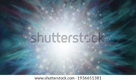 Shimmering sparkling spiritual feather background - bright white glitter centre with jade green feathers radiating outwards providing a spiritual esoteric background for messages
