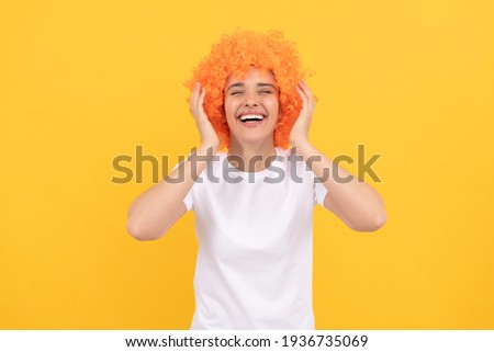 i am so happy. express positive emotions. cheerful lady wear wig. woman has orange hair. being a clown. april fools day. time for fun. girls birthday party. happy funny woman in curly wig.