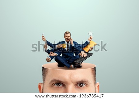 Instead of a brain, a man has a multi-armed businessman in his head. Creative picture, concept of multitasking, multi-hands, brain work, stress resistance Royalty-Free Stock Photo #1936735417