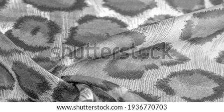 monochrome silk fabric, cheetah skin, african savannah theme. Background texture, pattern
