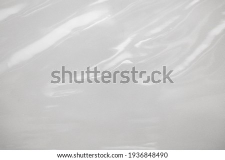 White plastic film wrap texture background Royalty-Free Stock Photo #1936848490