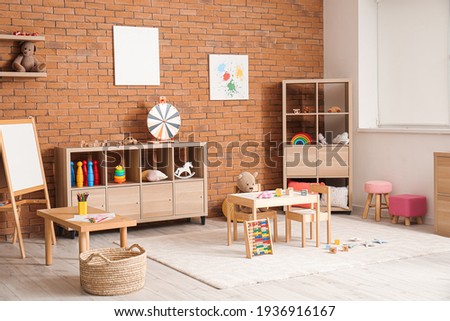 Interior of modern room in kindergarten Royalty-Free Stock Photo #1936916167