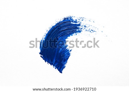 Blue brush stroke and texture. Grunge abstract hand - painted element. Underline and border design.