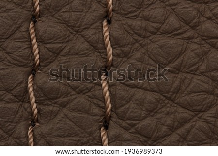 high-quality genuine leather texture with decorative seam