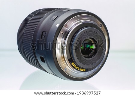 Camera or photo camera lens on a white background. Close-up. Macro shooting