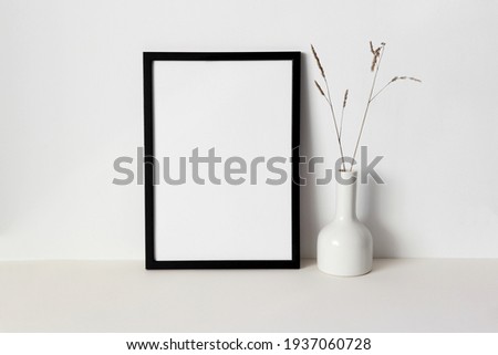 Frame mockup on the white wall