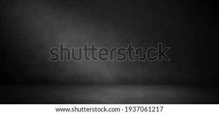 dark concrete wall and floor background, three dimensional room for mock up or product display Royalty-Free Stock Photo #1937061217
