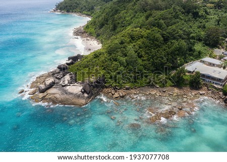 Seychelles beach and granite boulders overlooking the sea