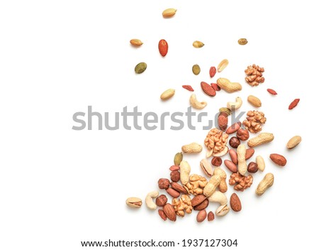 Mixed nuts isolated on white background. Top view. Copy space. Royalty-Free Stock Photo #1937127304