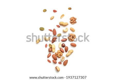 Mixed nuts isolated on white background. Top view. Copy space. Royalty-Free Stock Photo #1937127307