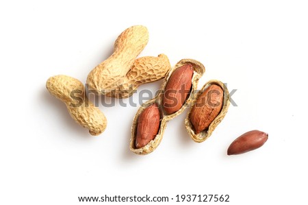 Peanuts in nutshell isolated on white background. Top view. Royalty-Free Stock Photo #1937127562