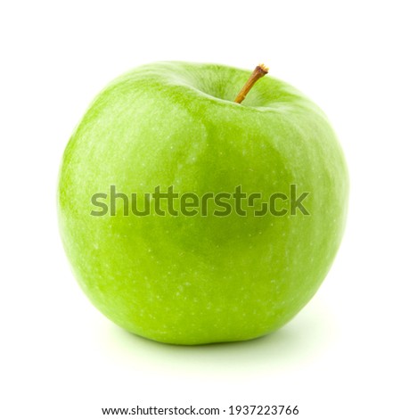 Green apple on a white background with a shadow.