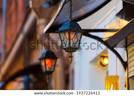 Beautiful decorative lanterns on the street of the city. High quality photo