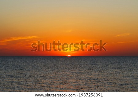 Beautiful sunset at the sea. Horizon. Selective focus. Background. Scenery. Texture.