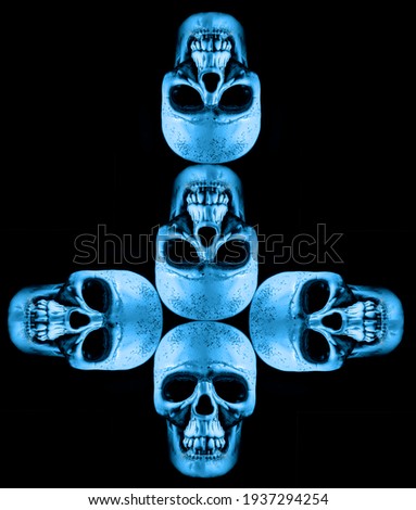 4 four Human skulls in the form of inverted cross . light and shadow. empty copy space for inscription.