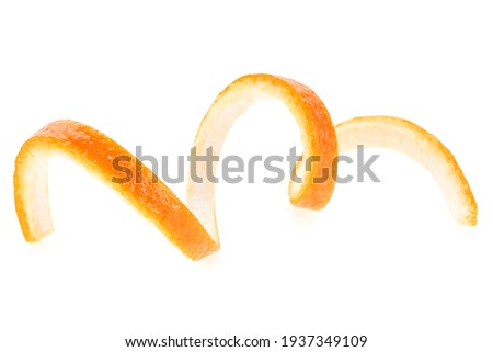 Orange twist isolated on a white background. Orange peel close-up. Orange citron. Royalty-Free Stock Photo #1937349109