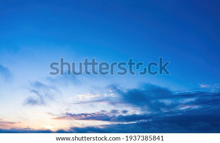 sunrise on blue sky. Blue sky with some clouds. Royalty-Free Stock Photo #1937385841