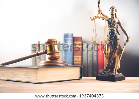 Law concept. law book with a wooden gavel and justice lady Royalty-Free Stock Photo #1937404375