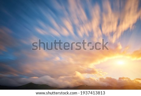 Beautiful sunset and pine forest in Carpathian mountains Royalty-Free Stock Photo #1937413813